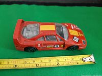 Left side view showing decals and length measurement