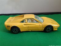 Left side view of yellow Durango Ferrari GTO die-cast model