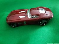 Maroon Fast Felon car left-side top view