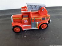 Left side showing full body, ladder, wheels