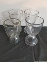 All four rummer glasses grouped