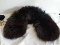 Fur collar laid in semicircle showing fur density and lining opening