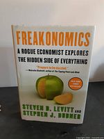 Front cover of hardcover book Freakonomics with dust jacket