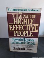 Front cover of hardcover book showing title, author, bestseller banner