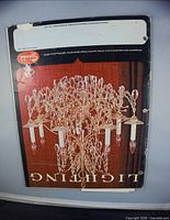 Front cover of Schonbek lighting catalogue booklet showing chandelier image