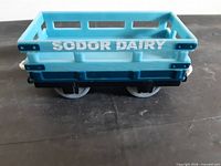 Side view showing Sodor Dairy lettering and overall condition