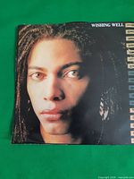 Front of picture sleeve showing artist portrait and title