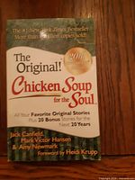 Front cover showing title and 20th Anniversary badge