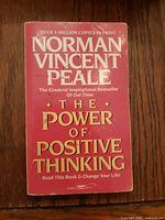 Front cover of paperback displaying title, author, cover design details