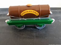 Side view showing Chocolate Syrup label and overall condition