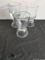 three clear glass rummers group view