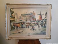 Full view of framed painting on wall