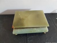 closed onyx jewelry box showing top surface