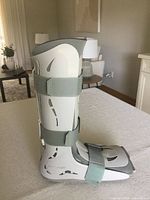 Side profile of Aircast FP Walker boot showing straps and shell