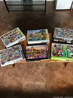 All six Eurographics puzzle boxes displayed on table