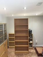 Front view of one Billy bookcase showing shelves and beech finish