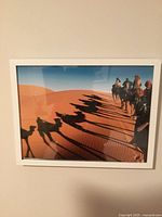 Sahara Desert camel caravan photo in white frame