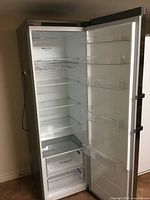 Front view with door open showing interior shelves and bins