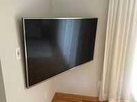 Front view of wall-mounted Panasonic TV
