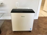 Front view of For Living dehumidifier on casters