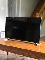 Front view of Samsung 32-inch TV on table