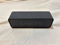 Front view of Anker SoundCore A3102 speaker showing grille and overall form