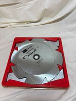 Top view of Craftsman Kromedge 8" dado blade set in red case