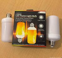 Front of retail box flanked by the two bulbs