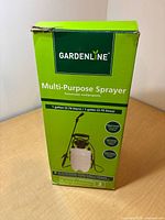 Front of unopened Gardenline sprayer box showing product image and features
