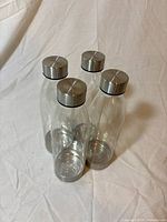 Four bottles grouped showing overall appearance