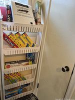 Full view of plastic shelf with wraps and bags