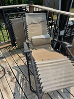 Both reclining chairs showing overall design, mesh sling, headrest and wear