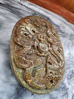 Top view showing carved dragon relief on jade ink stone