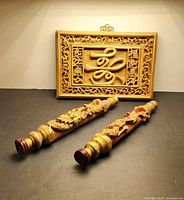 Plaque and both dragon carvings grouped