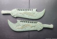 Both hardstone dragon swords front view