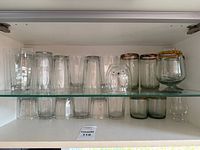 All glassware on shelf, front view