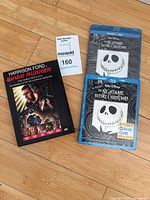 Front view of Blade Runner DVD case and two Nightmare Before Christmas Blu-ray/DVD sets