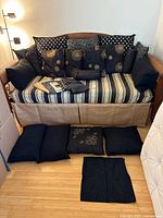 Overall view of cushions on sofa and fabric remnants