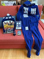 Group shot showing all Doctor Who items on sofa