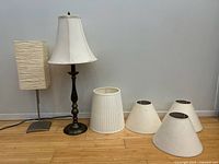 Overall lot: two lamps with shades and four additional shades