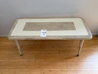 Top view showing rectangular beige and brown surface