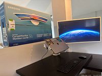 Monitor box and assembled monitor on desk