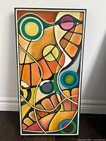 Front view of multicolour abstract painting on canvas