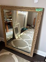 Full view of front of mirror showing frame and reflection