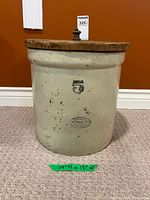 Front view showing crock, stamp and dimensions