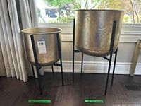 Both planters side by side to show size difference and finish