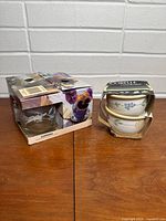 Both boxed sets side by side