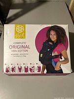 Photo of LILLEbaby Complete Original baby carrier box featuring model and product details.