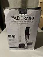 Box showing Paderno immersion hand blender with 2 speeds, whisk, and beaker
