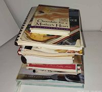 Stack of assorted cookbooks